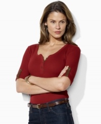 Chic roll-tab sleeves and supple faux-suede accents give a luxe update to Lauren by Ralph Lauren's classic ribbed-knit cotton Henley. Chic roll-tab sleeves and supple faux-suede accents give a luxe update to Lauren by Ralph Lauren's classic ribbed-knit cotton Henley.