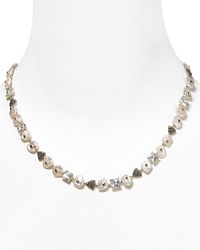 Judith Jack's pearl collar necklace with cubic zirconia stations sparkles with timeless charm. Wear this stunning, vintage-inspired adornment for an instant wow factor. Judith Jack's pearl collar necklace with cubic zirconia stations sparkles with timeless charm. Wear this stunning, vintage-inspired adornment for an instant wow factor.