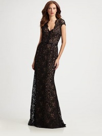 Utter romance: delicate floral lace in a sweeping, floor-length silhouette, cinched at the waist with a narrow satin belt.Scalloped V necklineCap sleevesSatin beltConcealed back zip with keyhole button closureFully linedAbout 45 from natural waist60% nylon/40% rayonDry cleanImported of domestic fabricModel shown is 5'10 (177cm) wearing US size 4. Utter romance: delicate floral lace in a sweeping, floor-length silhouette, cinched at the waist with a narrow satin belt.Scalloped V necklineCap sleevesSatin beltConcealed back zip with keyhole button closureFully linedAbout 45 from natural waist60% nylon/40% rayonDry cleanImported of domestic fabricModel shown is 5'10 (177cm) wearing US size 4.