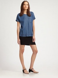 Chic chambray top has ruched shoulders, rolled cuffs and a single front patch pocket. RoundneckRuched shouldersShort sleeves with rolled cuffsSingle front patch pocketLyocellMachine washImportedModel shown is 5'9½ (176cm) wearing US size Small. Chic chambray top has ruched shoulders, rolled cuffs and a single front patch pocket. RoundneckRuched shouldersShort sleeves with rolled cuffsSingle front patch pocketLyocellMachine washImportedModel shown is 5'9½ (176cm) wearing US size Small.