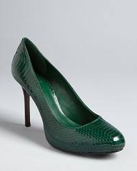 In a bold jewel tone and on-trend exotic print, Tory Burch's Marianne pumps are just the wake-up call your wardrobe needs. In a bold jewel tone and on-trend exotic print, Tory Burch's Marianne pumps are just the wake-up call your wardrobe needs.