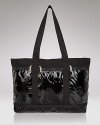 This shiny, durable patent nylon tote is roomy enough for chic weekend travel--and then some. By LeSportsac.