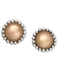 Simple studs with an extra edge. Set in sterling silver and 18k gold over sterling silver, these stud earrings by Jody Coyote offer a unique beaded design at the edges. Approximate diameter: 1/8 inch. Simple studs with an extra edge. Set in sterling silver and 18k gold over sterling silver, these stud earrings by Jody Coyote offer a unique beaded design at the edges. Approximate diameter: 1/8 inch.