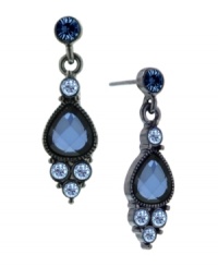 Wide, open spaces by 2028. The sky is the limit with these Montana-blue faceted crystal drop earrings accented by smaller round-cut blue crystals. Set in hematite-plated mixed metal. Approximate drop: 1-1/4 inches. Wide, open spaces by 2028. The sky is the limit with these Montana-blue faceted crystal drop earrings accented by smaller round-cut blue crystals. Set in hematite-plated mixed metal. Approximate drop: 1-1/4 inches.