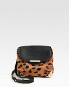 A petite style in luxurious animal print haircalf accented with smooth leather.Detachable adjustable leather shoulder strap, 20-23 dropSlide-lock flap closureProtective metal feetThree inner compartmentsFully lined9W X 7½H X 4DImported