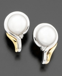 Pretty cultured freshwater pearls (7 mm) are even more beautiful in these diamond accent earrings set in 14k gold & sterling silver. Approximate length: 1/2 inches. Pretty cultured freshwater pearls (7 mm) are even more beautiful in these diamond accent earrings set in 14k gold & sterling silver. Approximate length: 1/2 inches.