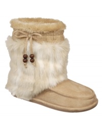 Beaded tie embellishment signifies the Native American-influenced aesthetic of Dr. Scholl's Chewy boots. Faux fur detailing on the shaft will help keep you toasty warm all winter long. Beaded tie embellishment signifies the Native American-influenced aesthetic of Dr. Scholl's Chewy boots. Faux fur detailing on the shaft will help keep you toasty warm all winter long.