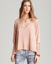 A high/low hem creates a chic drape effect on this wear-with-everything Nation LTD tee. A high/low hem creates a chic drape effect on this wear-with-everything Nation LTD tee.