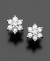 Beautiful flower earrings made from a girl's best friend; diamond earrings (1/5 ct. t.w.) set in 14k white gold are sure to make her smile.