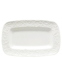 An elegant white-on-white pattern featuring an embossed vine motif and interior glaze lends the Opal Innocence Carved hors d'oeuvres tray to refined dining every day. An elegant white-on-white pattern featuring an embossed vine motif and interior glaze lends the Opal Innocence Carved hors d'oeuvres tray to refined dining every day.