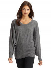 THE LOOKScoop necklineLong dolman sleeves with ribbed cuffsRibbed hemHorizontal snap placket across the backTHE FITAbout 28 from shoulder to hemTHE MATERIAL70% wool/30% cashmereCARE & ORIGINDry cleanImported