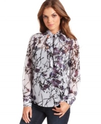 A winter-floral print makes this Kensie blouse a feminine pick for a chic pulled-together look! A winter-floral print makes this Kensie blouse a feminine pick for a chic pulled-together look!
