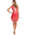 Scalloped hot-pink lace and sheer mesh make this BCBGMAXAZRIA mini dress a sweetly chic pick for soiree style!