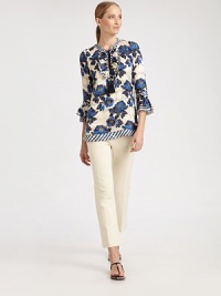A striking combination of colors create a requisite design for the season. The gilded details on the tassel ends are especially glamorous.Tassel and ruffle details at necklineTiered, ruffle cuffs on three-quarter sleevesPull-on styleAbout 27 from shoulder to hem55% rayon/45% silkDry cleanImported Model shown is 5'10 (177cm) wearing US size 4. OUR FIT MODEL RECOMMENDS ordering true size. A striking combination of colors create a requisite design for the season. The gilded details on the tassel ends are especially glamorous.Tassel and ruffle details at necklineTiered, ruffle cuffs on three-quarter sleevesPull-on styleAbout 27 from shoulder to hem55% rayon/45% silkDry cleanImported Model shown is 5'10 (177cm) wearing US size 4. OUR FIT MODEL RECOMMENDS ordering true size.