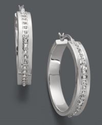 A must-have for every accessory collection. These bold hoop earrings feature a wide design accented by sparkling diamonds. Set in sterling silver. Approximate diameter: 1-3/8 inches. A must-have for every accessory collection. These bold hoop earrings feature a wide design accented by sparkling diamonds. Set in sterling silver. Approximate diameter: 1-3/8 inches.