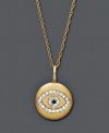 Keep good luck close to your heart. Sparkling pendant features the evil eye symbol in round-cut diamonds (1/10 ct. t.w.) with an irradiated diamond accent center. Setting and chain crafted in 14k gold. Approximate length: 18 inches. Approximate drop: 1/2 inch.