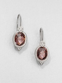 Beautifully faceted raspberry crystal stones set in intricately designed, sterling silver accented with dazzling white sapphires. Raspberry crystalsSterling silverWhite sapphiresDrop, about 1.4Hook backImported