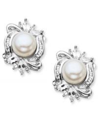 Charming and sophisticated. These elegant stud earrings combine cultured freshwater pearls (7 mm) and sparkling white topaz (1-1/6 ct. t.w.) in sterling silver. Approximate diameter: 11/16 inch. Charming and sophisticated. These elegant stud earrings combine cultured freshwater pearls (7 mm) and sparkling white topaz (1-1/6 ct. t.w.) in sterling silver. Approximate diameter: 11/16 inch.