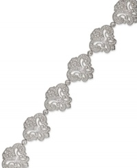Well-rounded elegance. This Eliot Danori bracelet is decorated with rows of swooping designs embellished with round-cut crystal accents and cubic zirconias (2-3/4 ct. t.w.). Set in rhodium-plated mixed metal. Approximate length: 7-1/4 inches. Well-rounded elegance. This Eliot Danori bracelet is decorated with rows of swooping designs embellished with round-cut crystal accents and cubic zirconias (2-3/4 ct. t.w.). Set in rhodium-plated mixed metal. Approximate length: 7-1/4 inches.