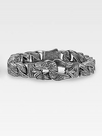 Woven sterling silver is handsomely engraved and styled with the Guardian center link accent across the front. 18K gold accent dual-locking clasp About 8½ long Made in USA