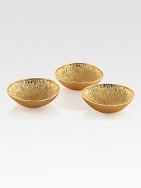 In Italy the lemon symbolizes luck and happiness, an inspiring motif that American craftsman Michael Aram has rendered in gold-plated relief on this stunning table-top set.From the Lemonwood CollectionGold-platedAbout 4¼ diam.Hand washImported In Italy the lemon symbolizes luck and happiness, an inspiring motif that American craftsman Michael Aram has rendered in gold-plated relief on this stunning table-top set.From the Lemonwood CollectionGold-platedAbout 4¼ diam.Hand washImported