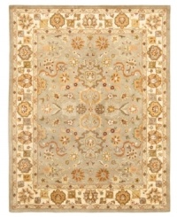 Earthy colored fibers are arranged in intricate patterns in the Heritage area rug from Safavieh, creating a look reminiscent of ancient royal textiles. Hand tufted and woven from pure wool by experienced artisans in India, it makes a refined statement wherever placed. (Clearance) Earthy colored fibers are arranged in intricate patterns in the Heritage area rug from Safavieh, creating a look reminiscent of ancient royal textiles. Hand tufted and woven from pure wool by experienced artisans in India, it makes a refined statement wherever placed. (Clearance)