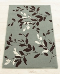 Silhouettes of leaves and branches in crisp ivory and deep brown are layered over sage in this inspiring Atwood Branch rug from Bacova. This modern design evokes a comforting atmosphere fit for any room in the house. Silhouettes of leaves and branches in crisp ivory and deep brown are layered over sage in this inspiring Atwood Branch rug from Bacova. This modern design evokes a comforting atmosphere fit for any room in the house.