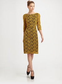 An elegant two-tone style, finished with exquisite floral embroidery and a back cutout featuring charming scalloped edges.BoatneckThree-quarter semi-sheer sleevesBack cutout with button closureConcealed back zipAllover contrast embroideryAbout 25 from natural waist60% cotton/35% nylon/5% spandexDry cleanImportedModel shown is 5'9½ (176cm) wearing US size 4. An elegant two-tone style, finished with exquisite floral embroidery and a back cutout featuring charming scalloped edges.BoatneckThree-quarter semi-sheer sleevesBack cutout with button closureConcealed back zipAllover contrast embroideryAbout 25 from natural waist60% cotton/35% nylon/5% spandexDry cleanImportedModel shown is 5'9½ (176cm) wearing US size 4.