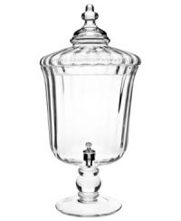 Entertain with the best of them: Godinger's Gatherings beverage dispenser. Fluted crystal with a dramatic lid and footed base makes an elegant impression on holiday party or dinner guests. Entertain with the best of them: Godinger's Gatherings beverage dispenser. Fluted crystal with a dramatic lid and footed base makes an elegant impression on holiday party or dinner guests.