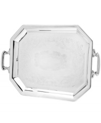 With lavishly engraved florals and sculpted handles, Godinger's octagonal tray can make the simplest foods look elegant. The gleam of silver plate adds a touch of luxury to any special occasion. With lavishly engraved florals and sculpted handles, Godinger's octagonal tray can make the simplest foods look elegant. The gleam of silver plate adds a touch of luxury to any special occasion.