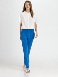The sleek look of silk trousers styled with a chic back skirt panel.Tab-front waistBelt loopsZip-flyFlat frontSide-zip skirt panelBack welt pocketRise, about 10Inseam, about 33SilkDry cleanImportedModel shown is 5'10 (177cm) wearing US size 4. The sleek look of silk trousers styled with a chic back skirt panel.Tab-front waistBelt loopsZip-flyFlat frontSide-zip skirt panelBack welt pocketRise, about 10Inseam, about 33SilkDry cleanImportedModel shown is 5'10 (177cm) wearing US size 4.