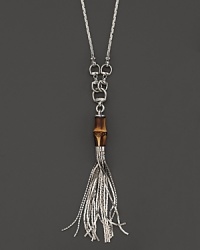 Sterling silver is a chic setting for a striking bamboo bead, horsebit detailing and a tassel. Double for drama or wear as-is. By Gucci. Sterling silver is a chic setting for a striking bamboo bead, horsebit detailing and a tassel. Double for drama or wear as-is. By Gucci.