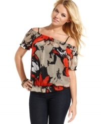 Rock chic, senorita style by day in this top from GUESS?: a medley of bold print, blouson fit and shoulder-baring design! Rock chic, senorita style by day in this top from GUESS?: a medley of bold print, blouson fit and shoulder-baring design!