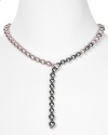 In a cool hue, Majorica's gray pearl strand is dark, stormy and seriously chic. Layer it over a little black dress as an alternative to classic whites.