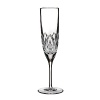 Boasting a tapered silhouette and elongated stem, the intricate Brodey pattern adorning this Waterford champagne glass adds dazzling opulence to your table.