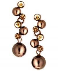 Be the belle of the balls with this pair of earrings from Givenchy. Glass pearls and stunning glass accents star in the earrings crafted from brown gold-tone mixed metal. Approximate drop: 1-1/2 inches. Be the belle of the balls with this pair of earrings from Givenchy. Glass pearls and stunning glass accents star in the earrings crafted from brown gold-tone mixed metal. Approximate drop: 1-1/2 inches.