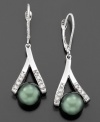 Exotic Tahitian pearls (8-9 mm) dangle elegantly from a unique setting of 14k white gold studded with diamond accents on these beautiful drop earrings. Approximate drop: 1-1/2 inches.