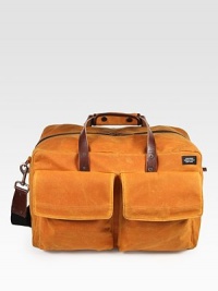 A versatile, dependable duffel is designed in a wax-impregnated canvas that combines the durability of nylon and the ease of cotton for greater strength and abrasion resistance.Zip closureTop handleAdjustable shoulder strapExterior, interior pocketsWaxed cotton canvas18W x 11H x 10DImported