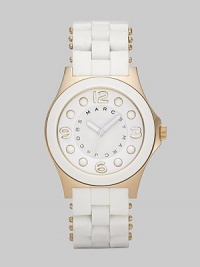 A sleek, understated timepiece with goldplated stainless steel accents and silicon wrapped bracelet.Quartz movement Water resistant to 5 ATM Goldplated stainless steel case, 36.5mm, (1.43) White dial Numeral and dot hour markers Second hand Silicon wrapped stainless steel bracelet, 18mm, (.71) Imported 