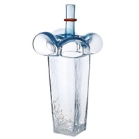 Rustic, upright vases with big bubbles and a décor of warm, natural colors. Rustic, upright vases with big bubbles and a décor of warm, natural colors.