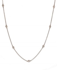 Inch by inch of luminous sparkle. B. Brilliant's delicate necklace features eleven round-cut cubic zirconia stations (1-1/10 ct. t.w.) set in 18k gold over sterling silver. Approximate length: 36 inches. Inch by inch of luminous sparkle. B. Brilliant's delicate necklace features eleven round-cut cubic zirconia stations (1-1/10 ct. t.w.) set in 18k gold over sterling silver. Approximate length: 36 inches.