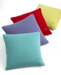 Add a preppy punch of color to any room with the Pique decorative pillow from Lacoste. Each pillow features the soft, 100% cotton pique fabric true to the essence of the famous Lacoste polo shirt, trimmed with pique piping along the edges. The pillow also features the signature embroidered crocodile logo and pearl Lacoste buttons on the reverse. Add a preppy punch of color to any room with the Pique decorative pillow from Lacoste. Each pillow features the soft, 100% cotton pique fabric true to the essence of the famous Lacoste polo shirt, trimmed with pique piping along the edges. The pillow also features the signature embroidered crocodile logo and pearl Lacoste buttons on the reverse.