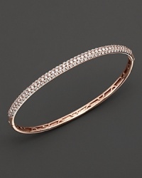 Pavé diamond bangle in 14 kt. rose gold. Hinged closure. Pavé diamond bangle in 14 kt. rose gold. Hinged closure.