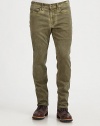Light distressing and an edgy faded wash defines this urban-inspired style, crafted in soft cotton with a hint of stretch, in a comfortable slim-straight leg.Five-pocket styleInseam, about 3493% cotton/6% polyester/1% lycraMachine washImported