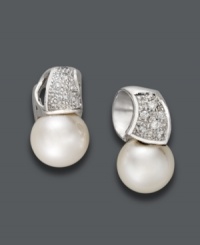 Say hello to elegance. Belle de Mer stud earrings feature a luxurious mix of cultured freshwater pearls (9-10 mm) and sparkling, round-cut diamonds (1/5 ct. t.w.) in a 14k white gold wave setting. Approximate drop: 3/8 inch. Say hello to elegance. Belle de Mer stud earrings feature a luxurious mix of cultured freshwater pearls (9-10 mm) and sparkling, round-cut diamonds (1/5 ct. t.w.) in a 14k white gold wave setting. Approximate drop: 3/8 inch.
