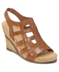 Treat your wardrobe to an amazing wedge. The Plush or Minus sandals by Aerosoles pair with virtually anything, thanks to their timelessly stylish design and comfort features.