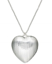 A look you're sure to love. Giani Bernini's sterling silver necklace with puffed heart pendant is a perfect addition for any type of formal affair. Approximate length: 21 inches + 2-inch extender. Approximate drop: 1-1/4 inches. A look you're sure to love. Giani Bernini's sterling silver necklace with puffed heart pendant is a perfect addition for any type of formal affair. Approximate length: 21 inches + 2-inch extender. Approximate drop: 1-1/4 inches.