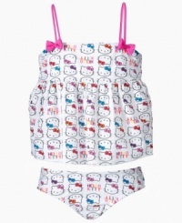 Make a splash! Get her ready to show off her sunny style with this adorable empire-waist tankini from Hello Kitty. Make a splash! Get her ready to show off her sunny style with this adorable empire-waist tankini from Hello Kitty.