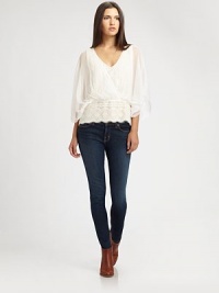 Romantic lace trim and scalloped eyelash edges add feminine charm to this semi-sheer surplice blouse. Semi-sheer surplice topThree-quarter dolman sleevesElastic waistbandScalloped lace-trim hemPolyester lace tank liningShell: PolyesterTrim: 57% cotton/43% nylonDry cleanImportedModel shown is 5'10 (177cm) wearing US size Small. Romantic lace trim and scalloped eyelash edges add feminine charm to this semi-sheer surplice blouse. Semi-sheer surplice topThree-quarter dolman sleevesElastic waistbandScalloped lace-trim hemPolyester lace tank liningShell: PolyesterTrim: 57% cotton/43% nylonDry cleanImportedModel shown is 5'10 (177cm) wearing US size Small.