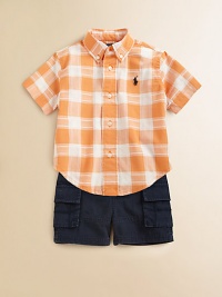 A perfect preppy pairing for the warmer weather, this classic ensemble features a plaid shirt A perfect preppy pairing for the warmer weather, this classic ensemble features a plaid shirt